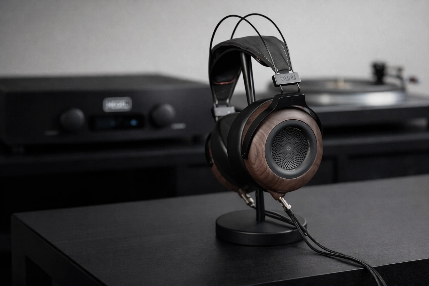 DUNU Mortise open-back headphones combine a 50mm carbon fiber driver, N52 magnets and walnut earcups for a natural, spacious sound with excellent detail and comfort.