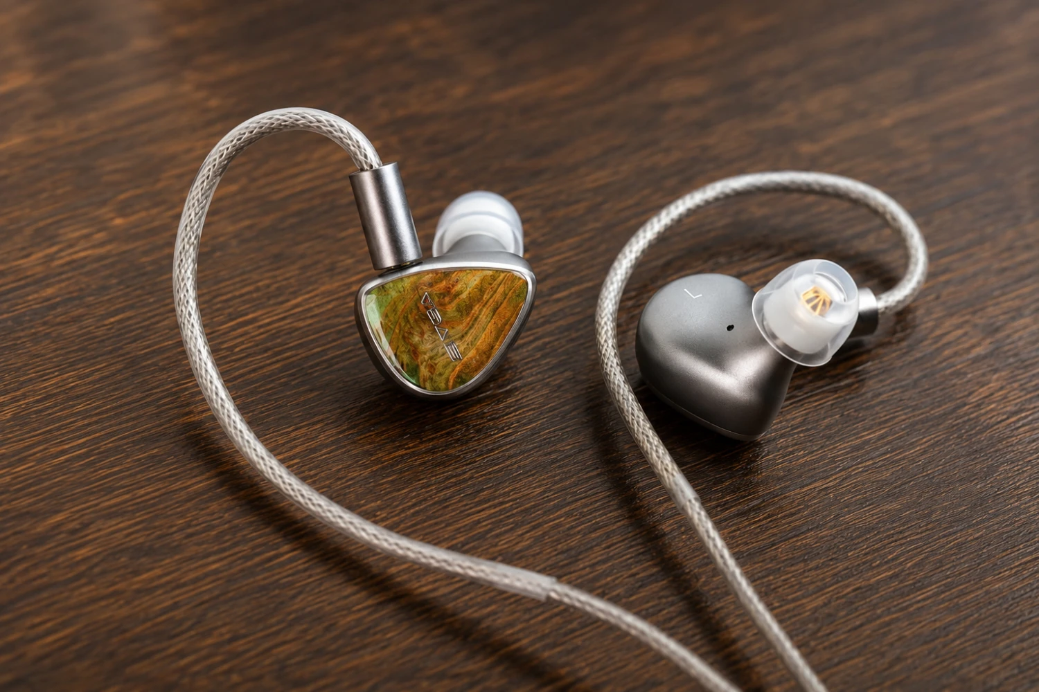 The Sivga Lyrebird is a wired hybrid in-ear monitor built around four driver types, handcrafted stabilized wood faceplates and a balanced 4.4mm cable.